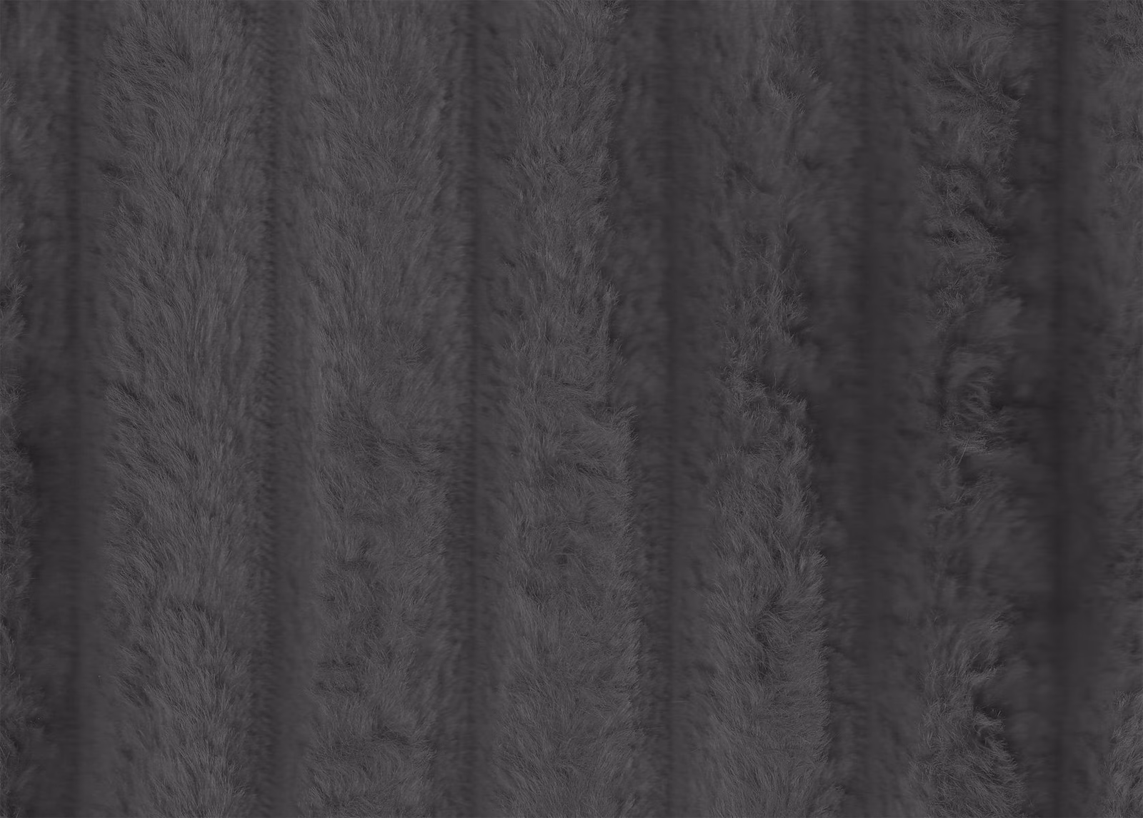 Deep charcoal faux fur with vertical directional pile and softly shaded textured bands