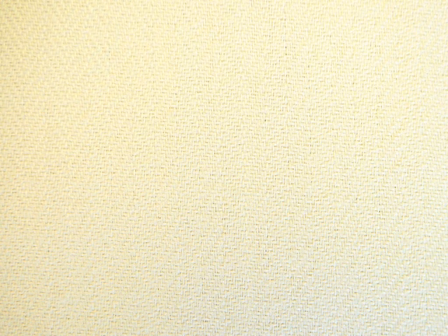 Pale buttery cream chenille showing a fine, softly textured woven surface