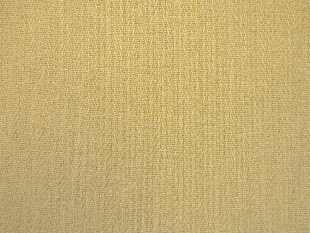 Muted ochre-gold chenille with a fine textured woven surface