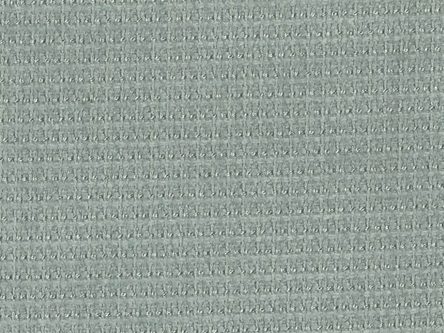 Muted sage-green chenille with fine horizontal slubs and a softly reflective surface