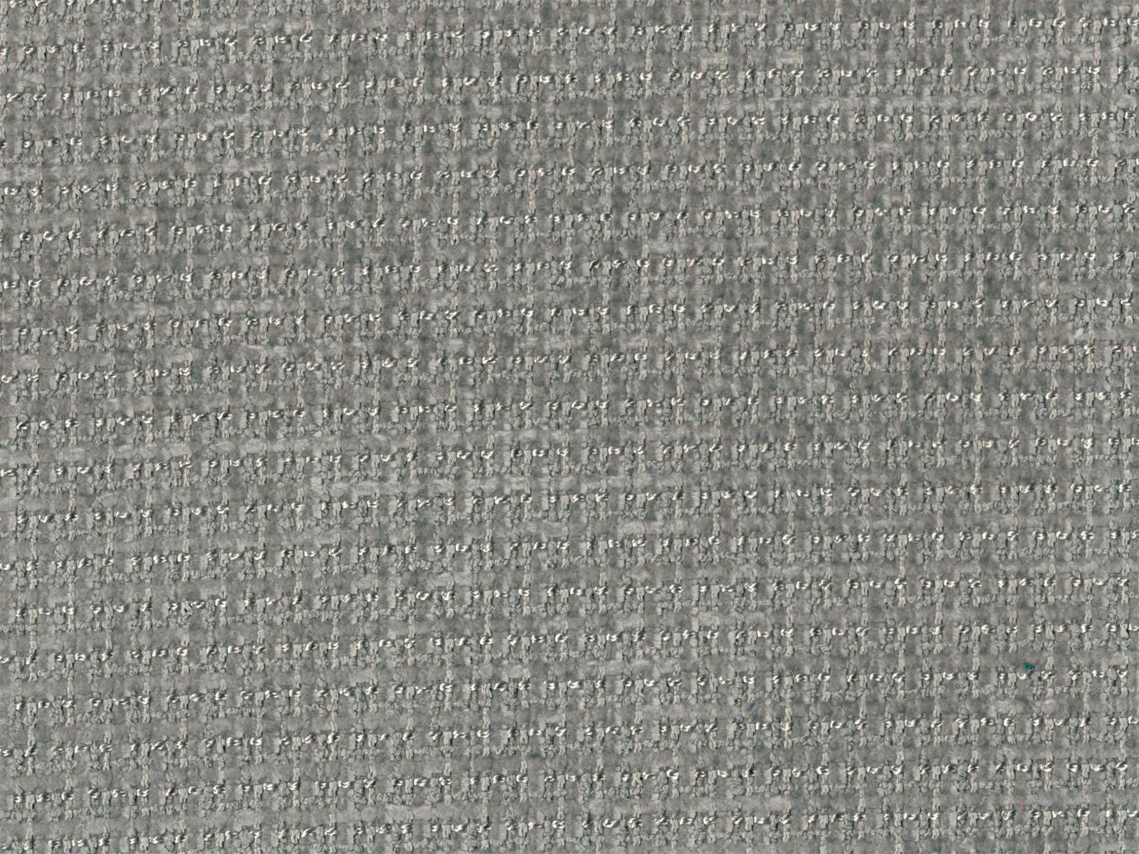 Close-up of cool grey chenille with fine horizontal texture and pale flecks