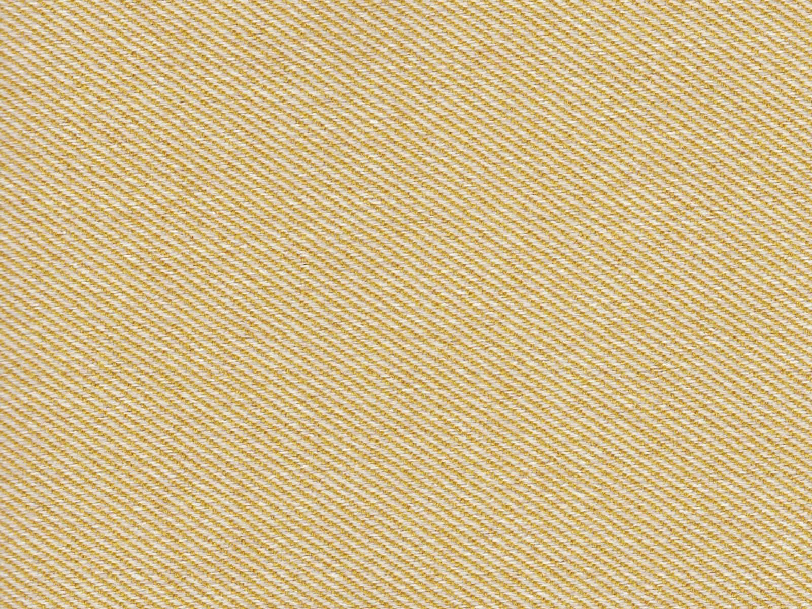 Warm straw-beige flat weave with fine diagonal texture and subtle golden threads