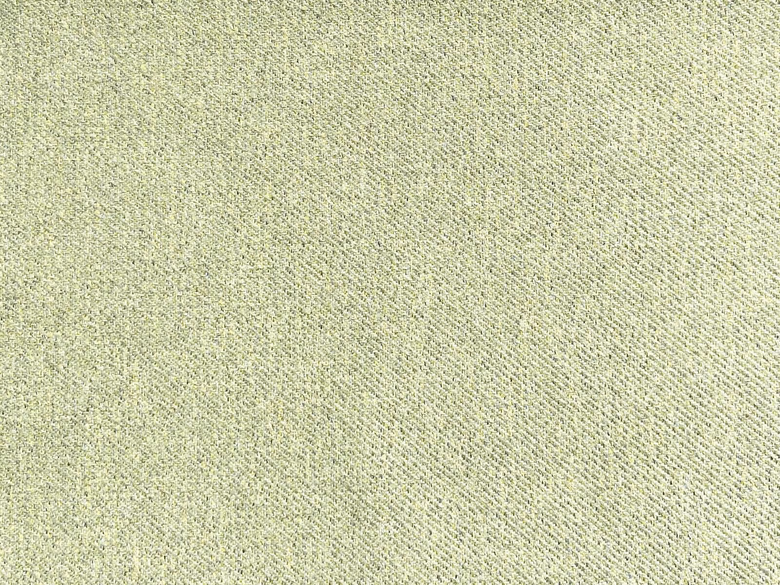 Pale sage flat weave with fine diagonal texture and scattered darker flecks