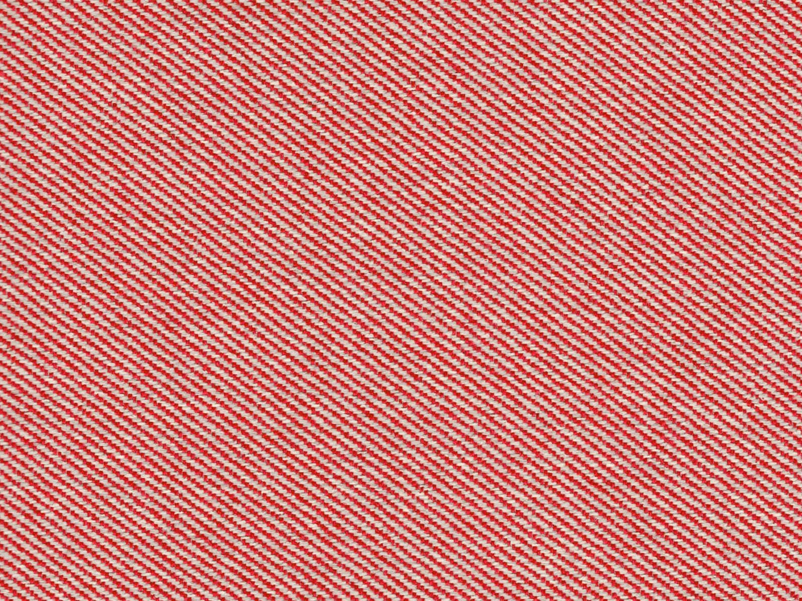 Crimson red and ivory diagonal flat-weave upholstery fabric with fine textured surface