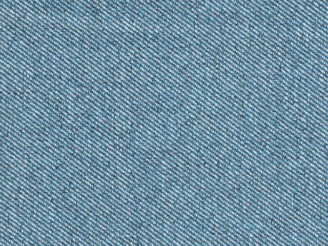 Cool blue-teal flat weave with fine diagonal threads and softly mottled texture