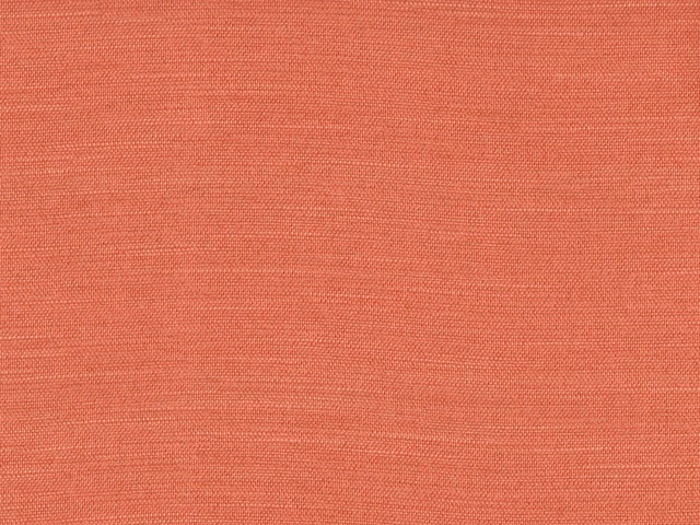 Close-up of warm coral terracotta flat weave with fine horizontal texture