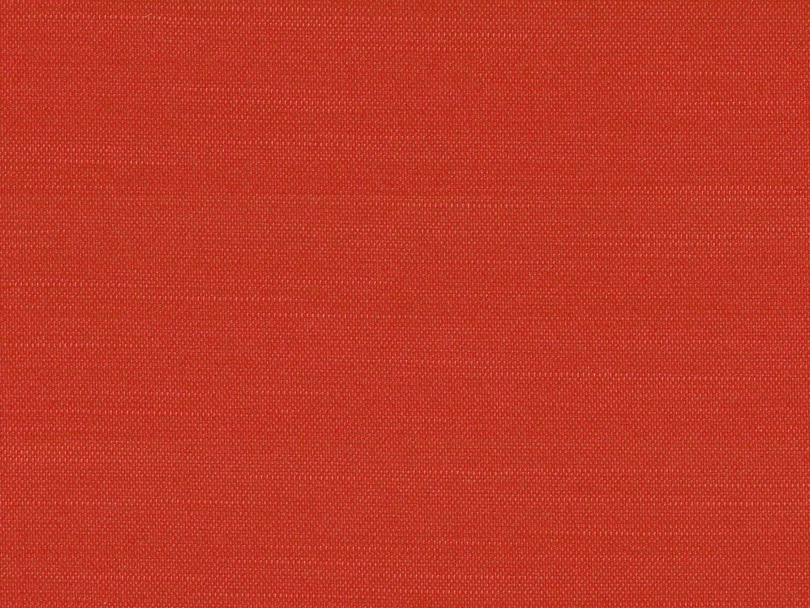 Close-up of warm brick-red flat weave with fine crosshatched polyester texture