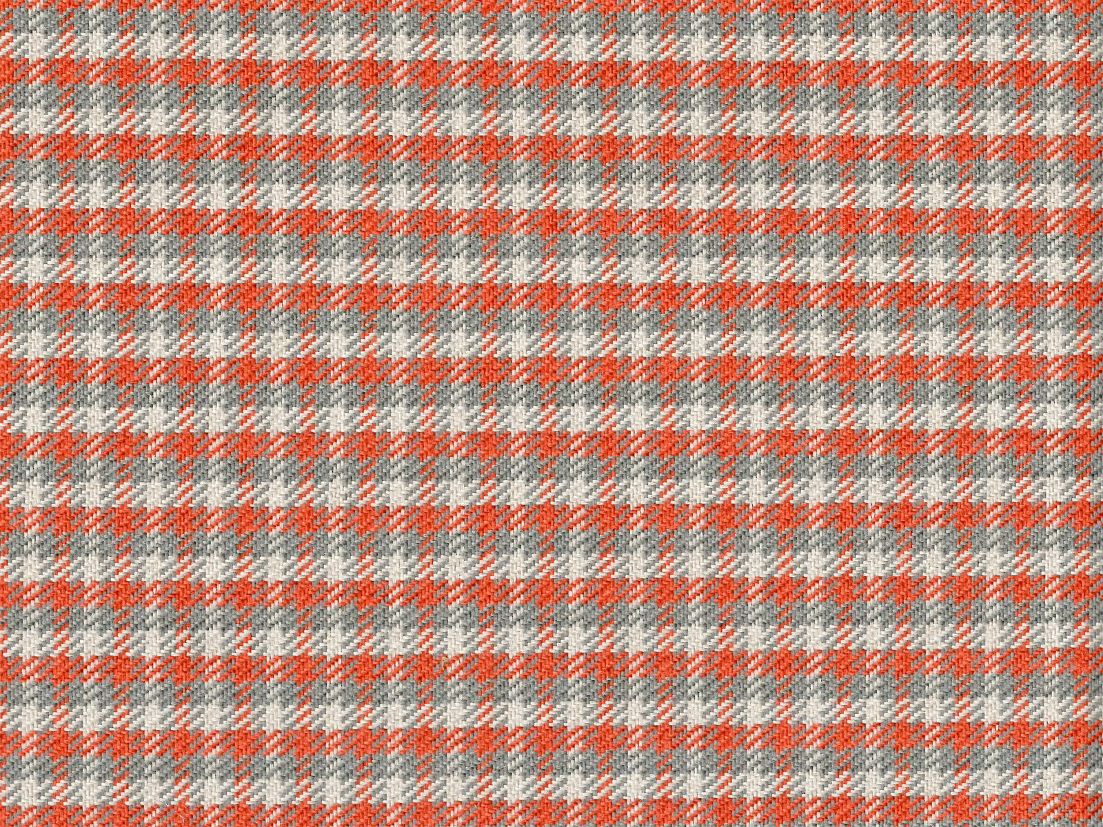 Close-up of coral red, grey and cream chenille in a small woven check