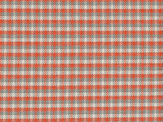 Close-up of coral red, grey and cream chenille in a small woven check