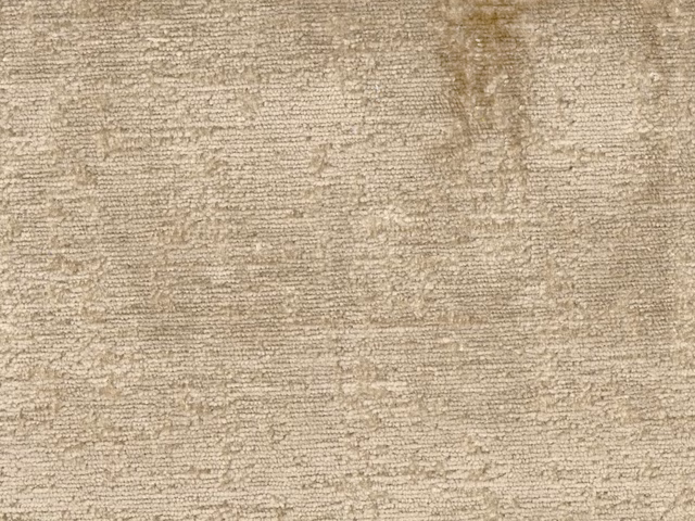 Warm taupe-beige chenille with fine horizontal ridges and softly mottled shading