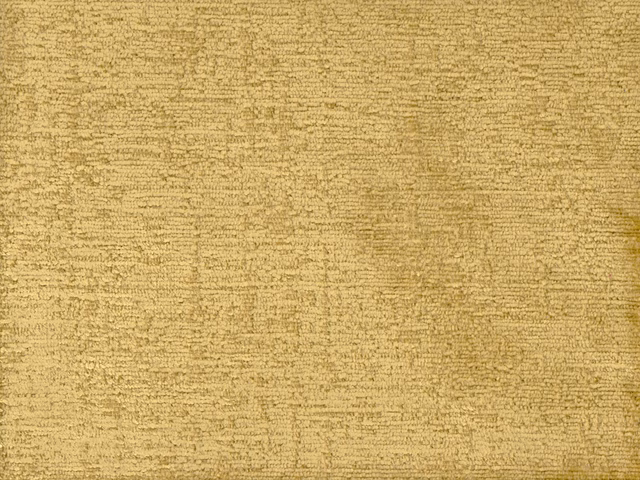 Close-up of muted straw-gold chenille with irregular horizontal slub texture