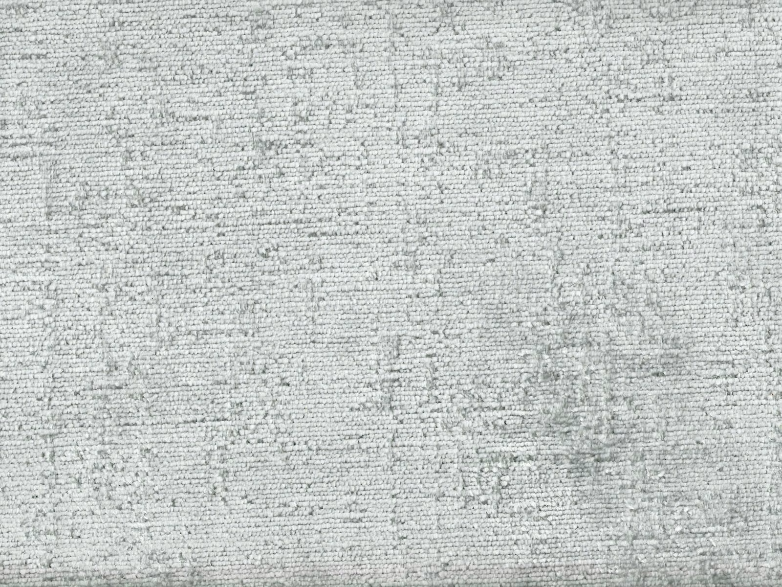 Pale green-grey chenille with fine horizontal ridges and softly mottled texture