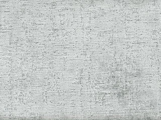 Pale green-grey chenille with fine horizontal ridges and softly mottled texture