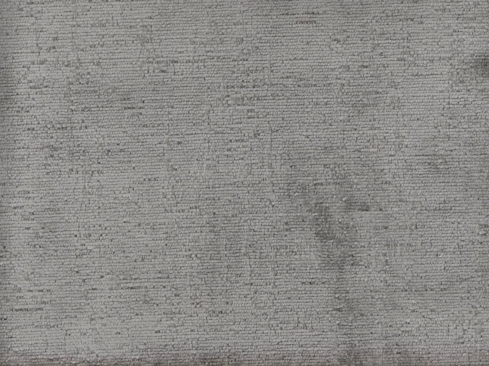 Cool grey chenille with fine horizontal ridges and softly mottled shading