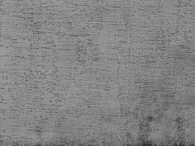 Mottled mid-grey chenille with fine horizontal ribbing and darker flecked texture