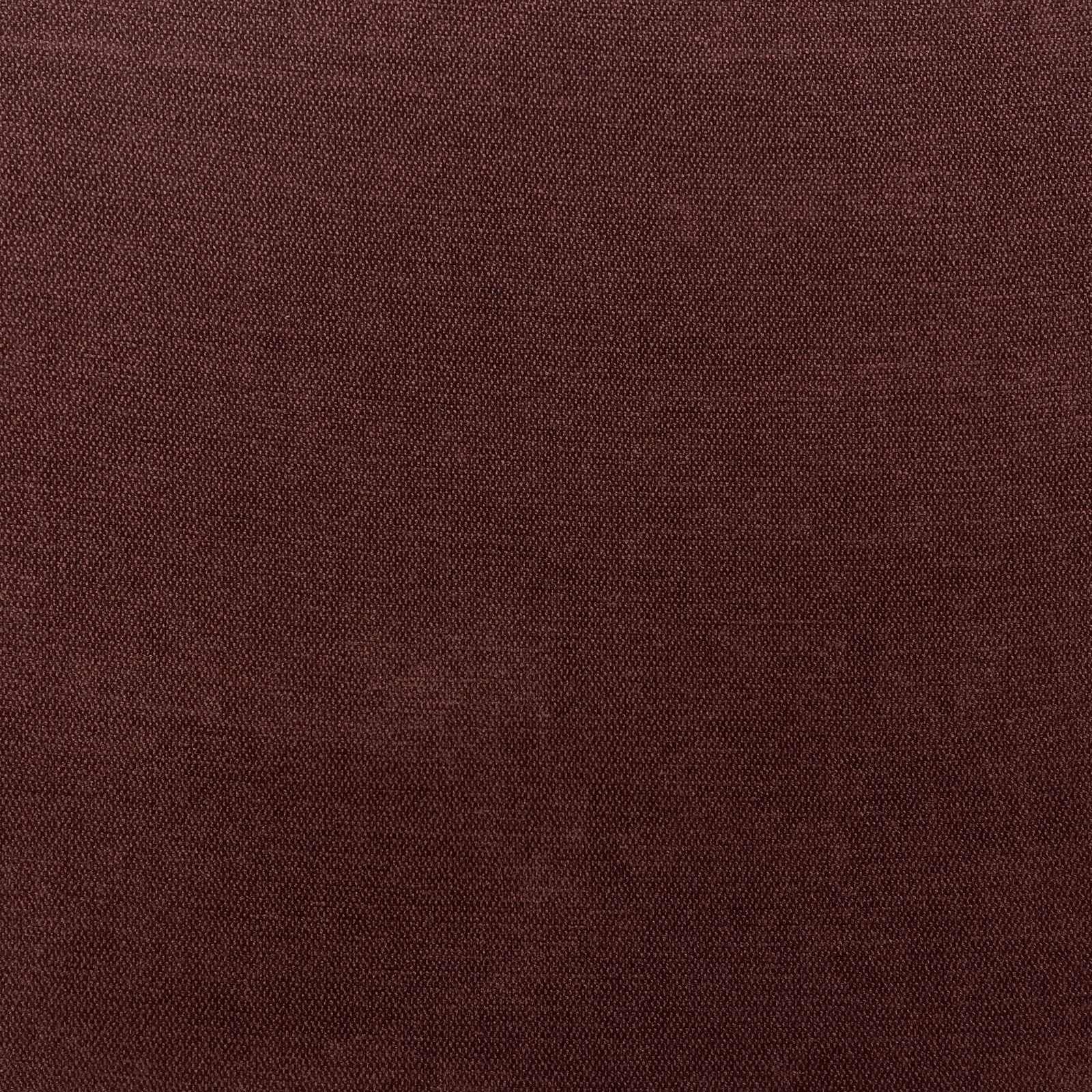 Close-up of deep burgundy chenille with a fine, subtly mottled woven texture