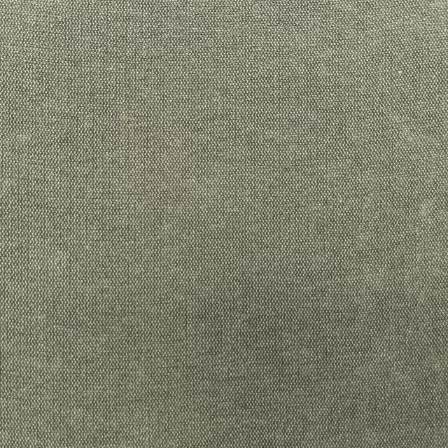 Close-up of muted grey-olive chenille with a fine, softly mottled woven texture