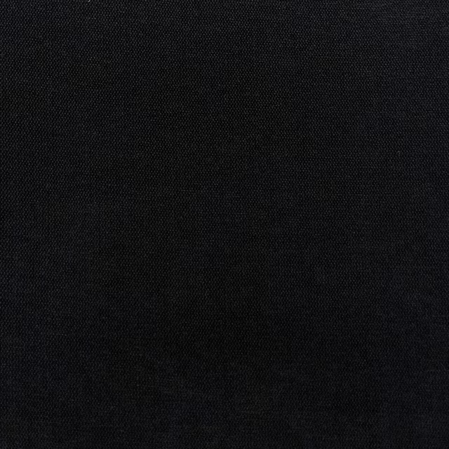 Near-black charcoal chenille with a dense, subtly tonal woven surface