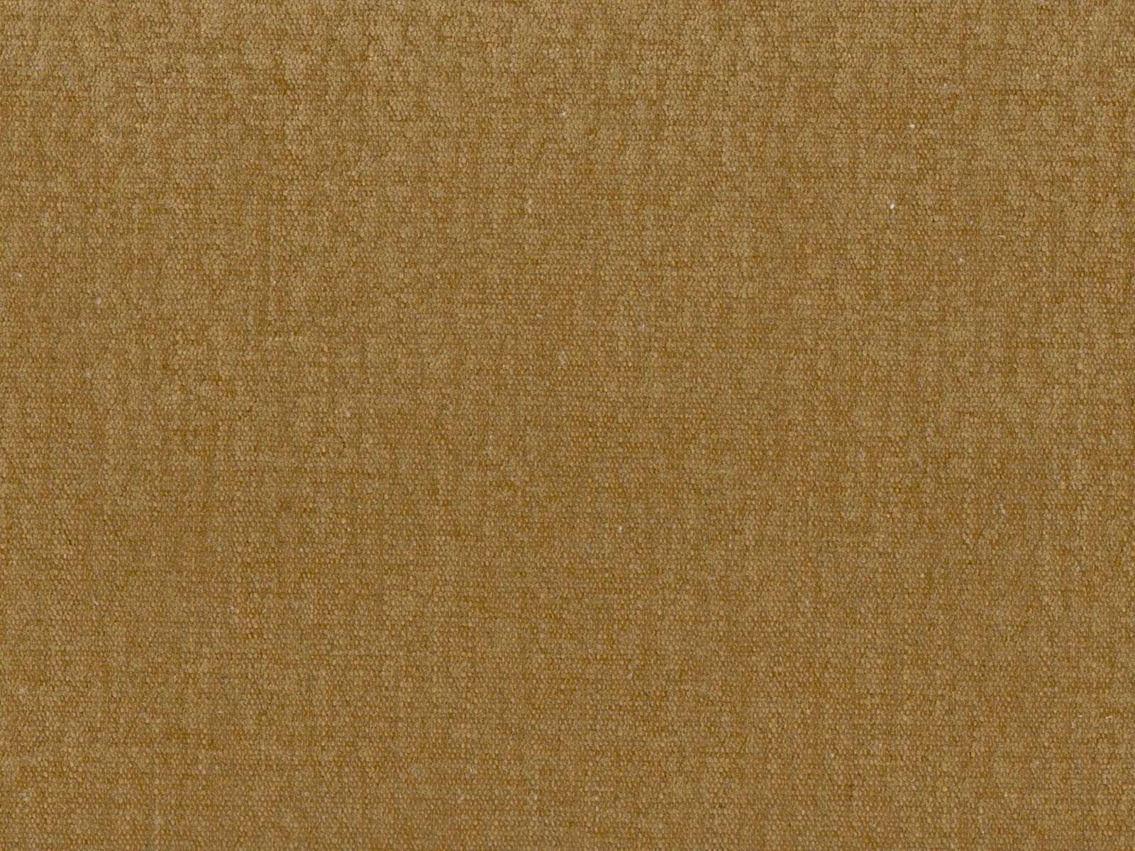 Close-up of muted ochre-gold flat weave with fine crosshatched yarn texture