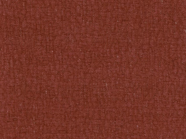 Muted rust terracotta flat weave with subtle tonal crosshatch texture