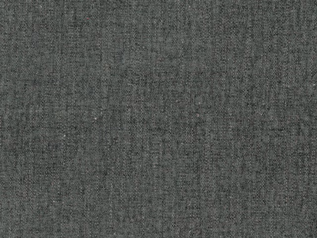 Mottled charcoal-grey flat weave with fine irregular grain and subtle tonal texture