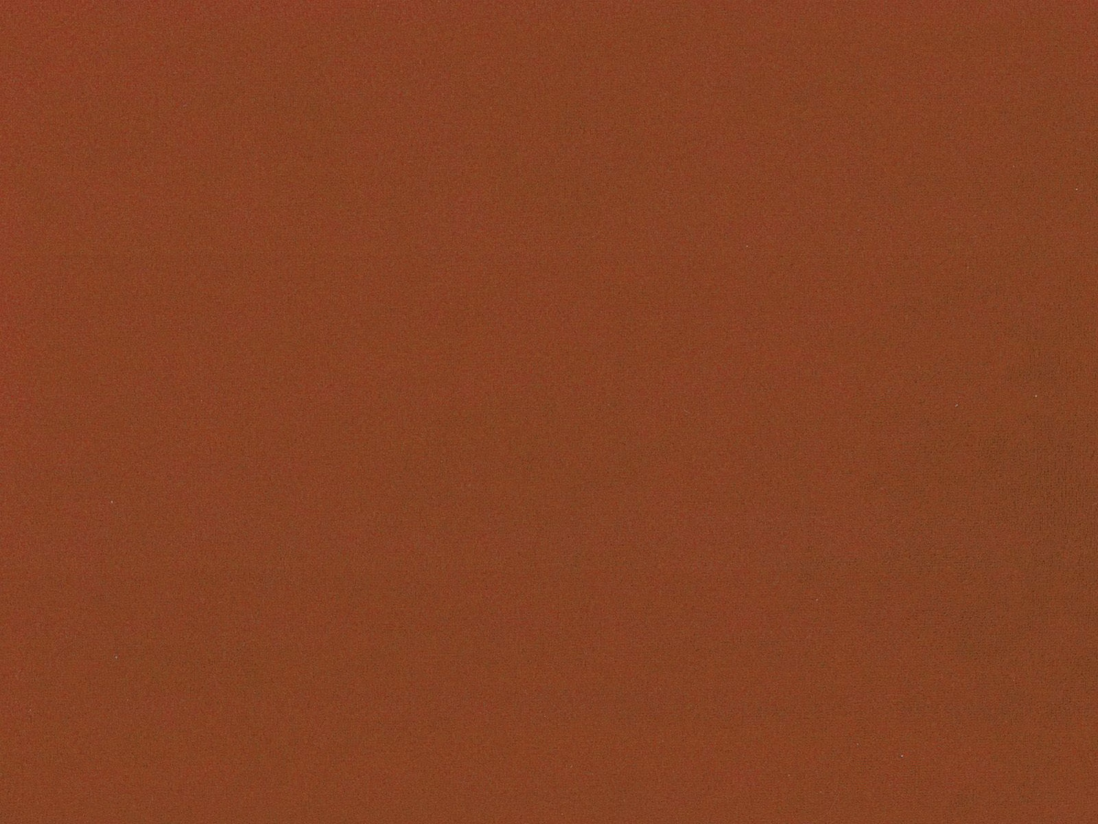 Burnt terracotta red plain velvet with subtle directional pile shading