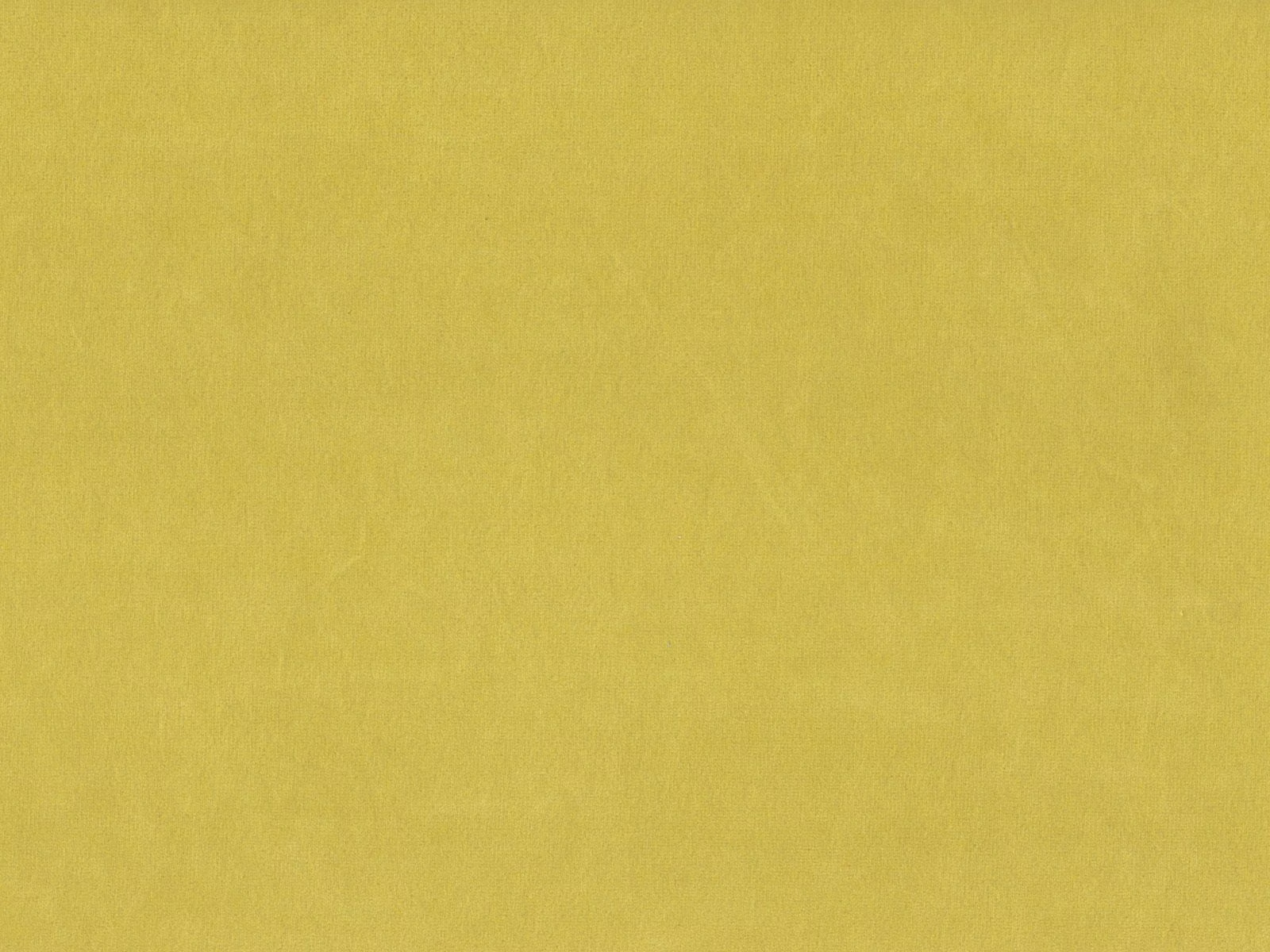 Chartreuse-yellow plain velvet swatch with softly shaded, luminous pile