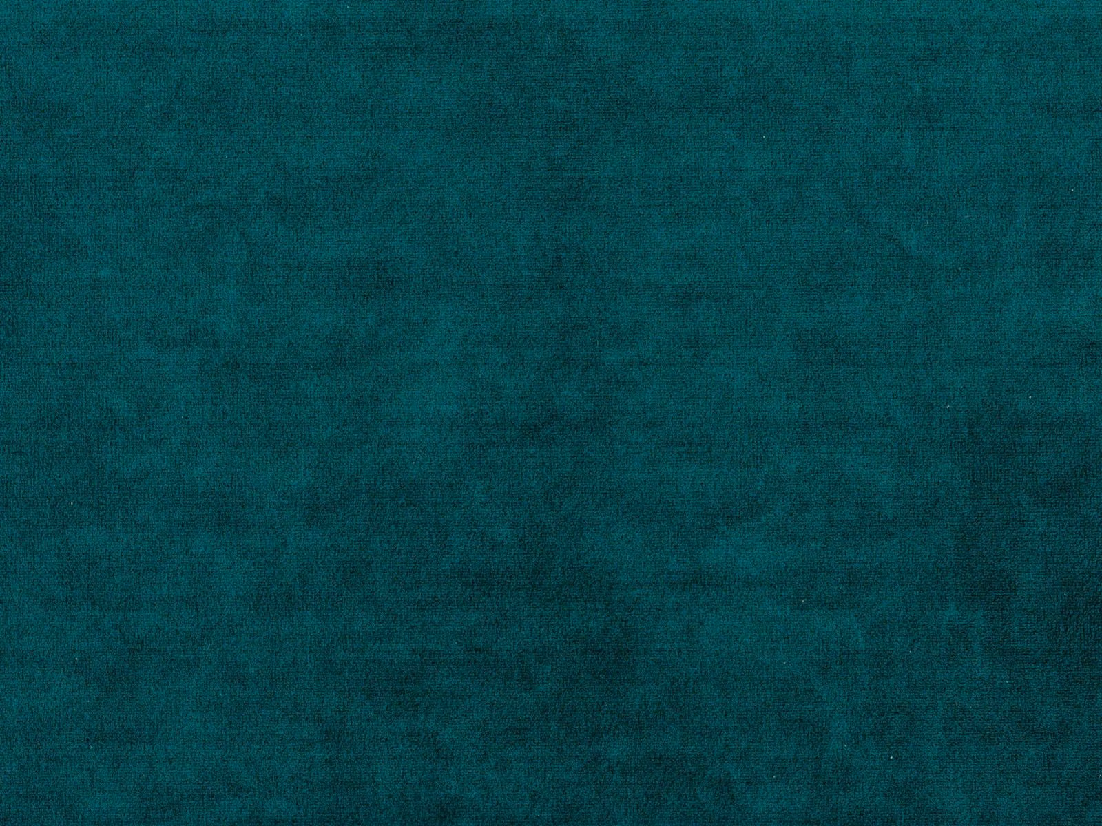 Deep teal velvet with a softly mottled, light-catching pile