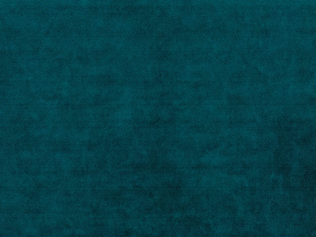 Deep teal velvet with a softly mottled, light-catching pile