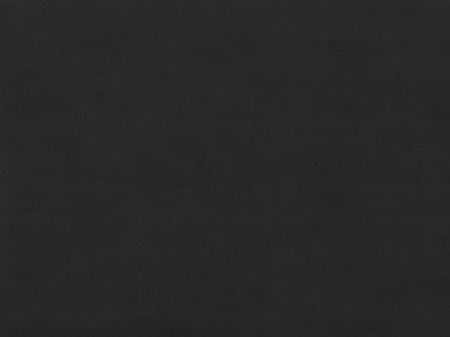 Deep charcoal-black velvet swatch showing subtle directional pile shading