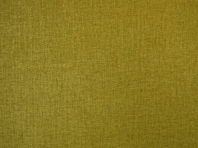 Muted olive chenille showing a fine tonal herringbone weave with mustard-green depth