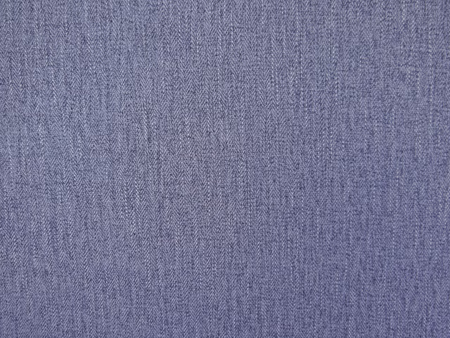 Muted blue-lilac chenille with a fine herringbone weave and softly flecked texture