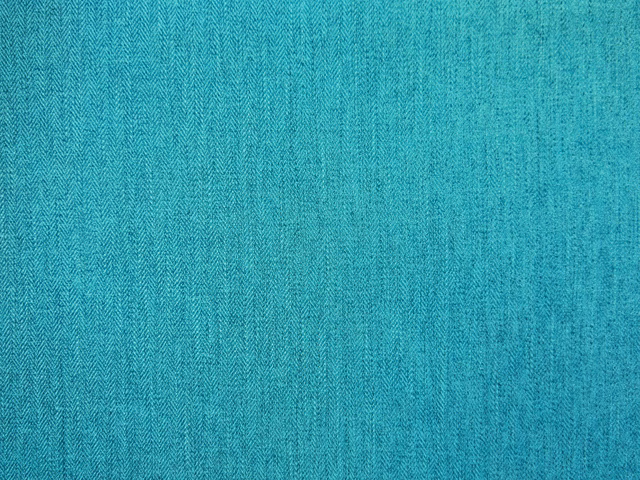 Turquoise teal chenille with fine vertical chevron weave and softly varied texture