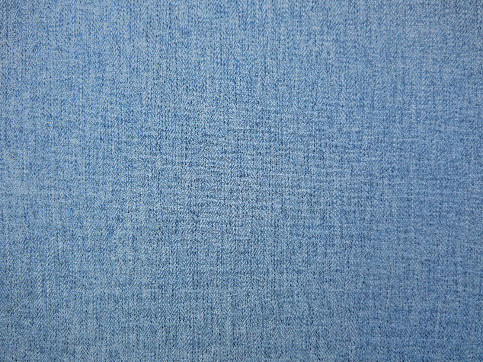 Muted denim-blue chenille with fine vertical slub texture and softly mottled shading