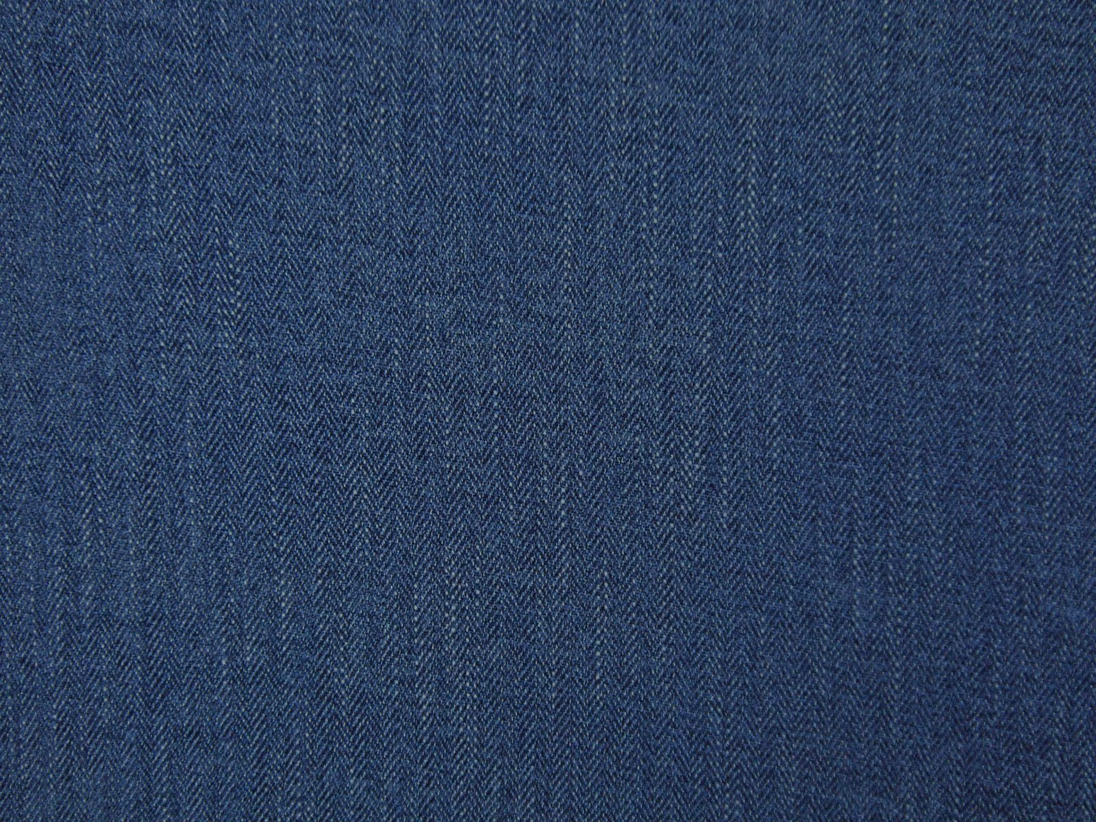 Deep denim-blue chenille with a fine vertical herringbone texture