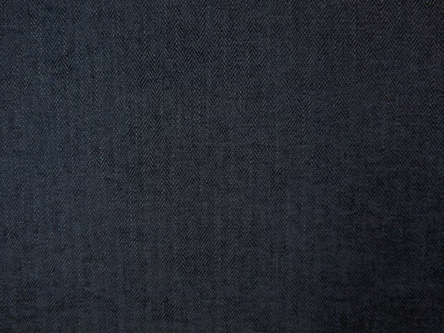Deep charcoal chenille with a subtle cool blue-green herringbone texture