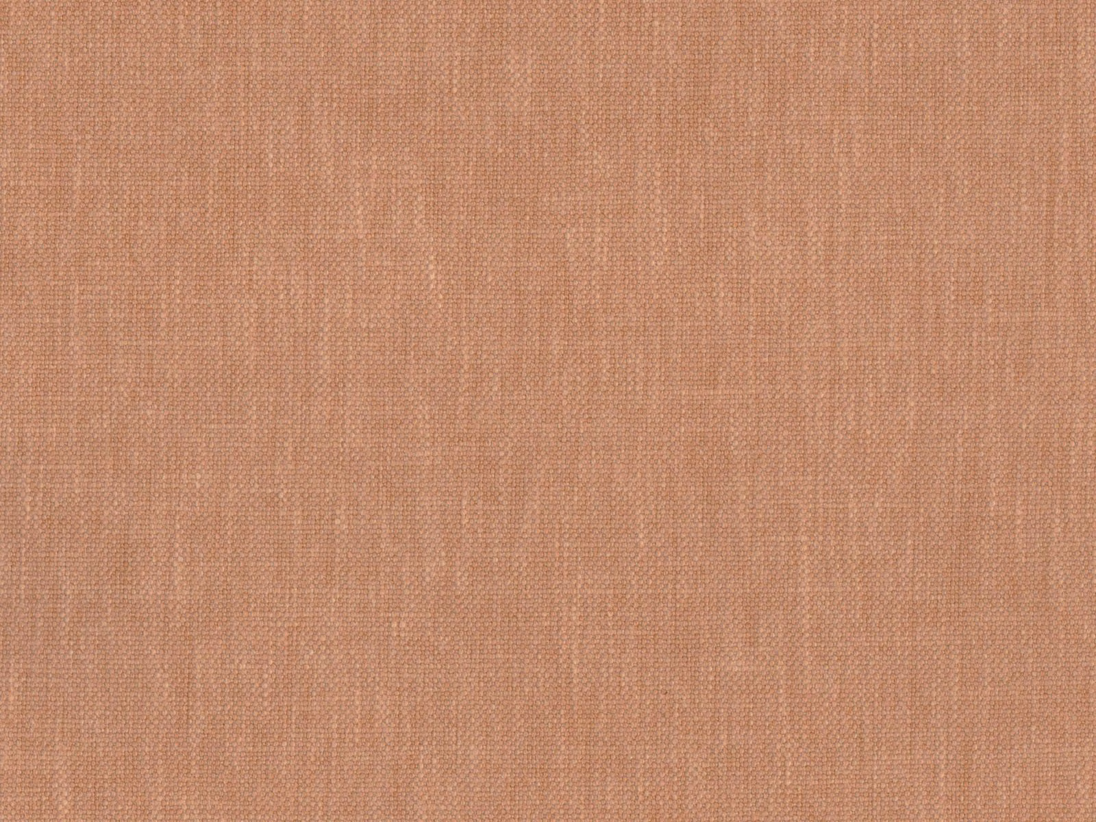 Close-up of muted terracotta flat weave with fine crosshatched texture