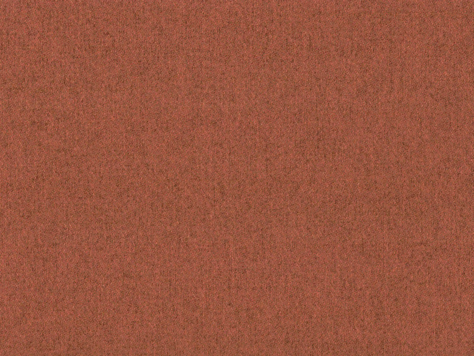 Muted terracotta faux wool fabric with a softly mottled fine weave