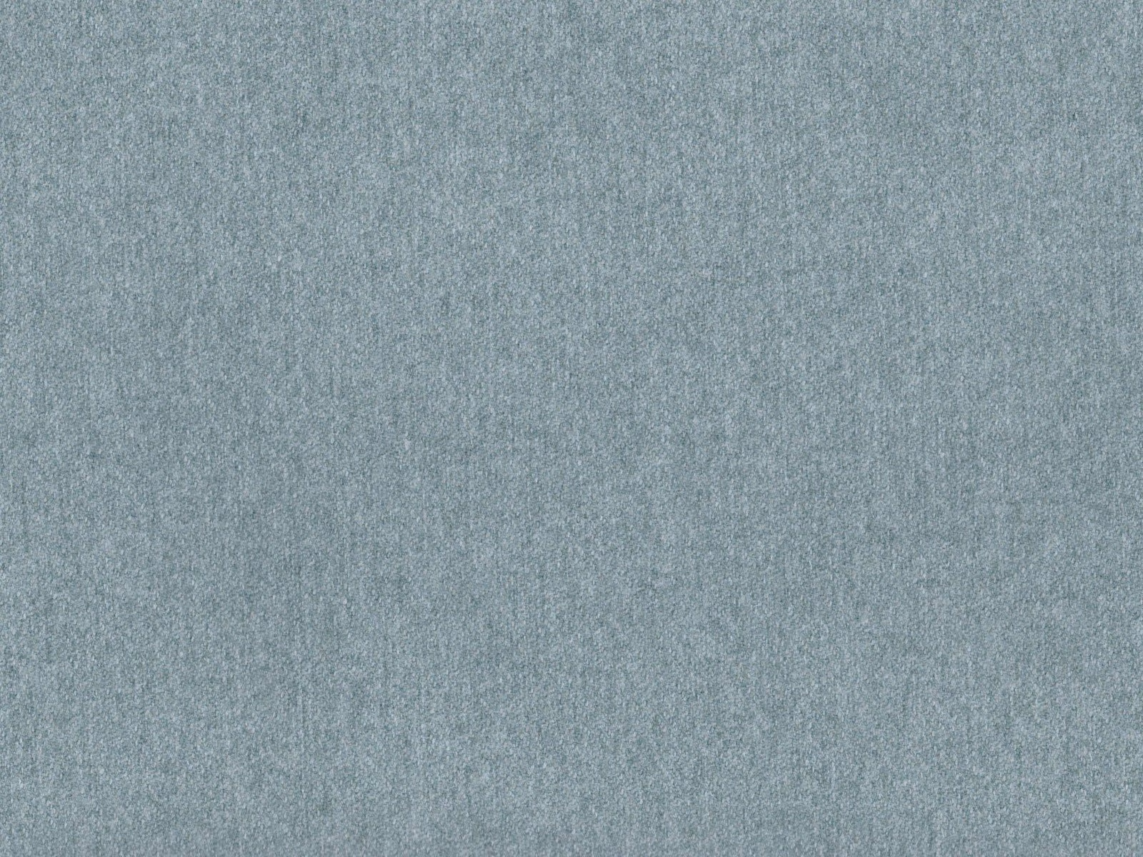 Close-up of muted blue-grey faux wool with a softly mottled woven surface