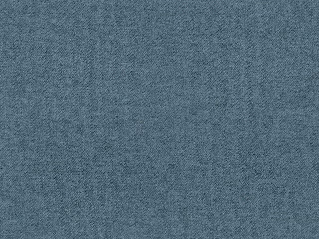 Close-up of cool blue-grey faux wool with a softly flecked, brushed texture