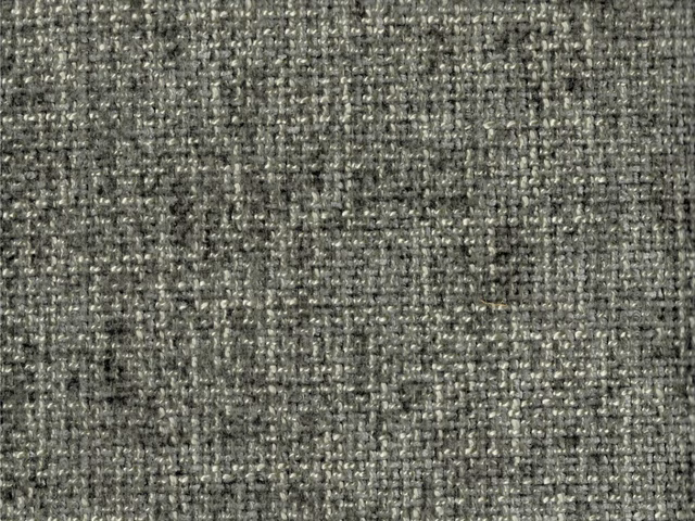 Mottled charcoal-grey chenille with dense irregular woven texture and pale flecks
