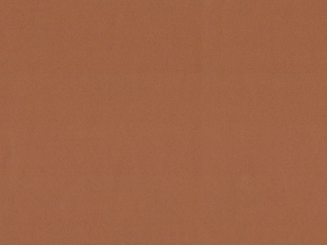Muted terracotta faux leather showing a smooth, fine-grained surface