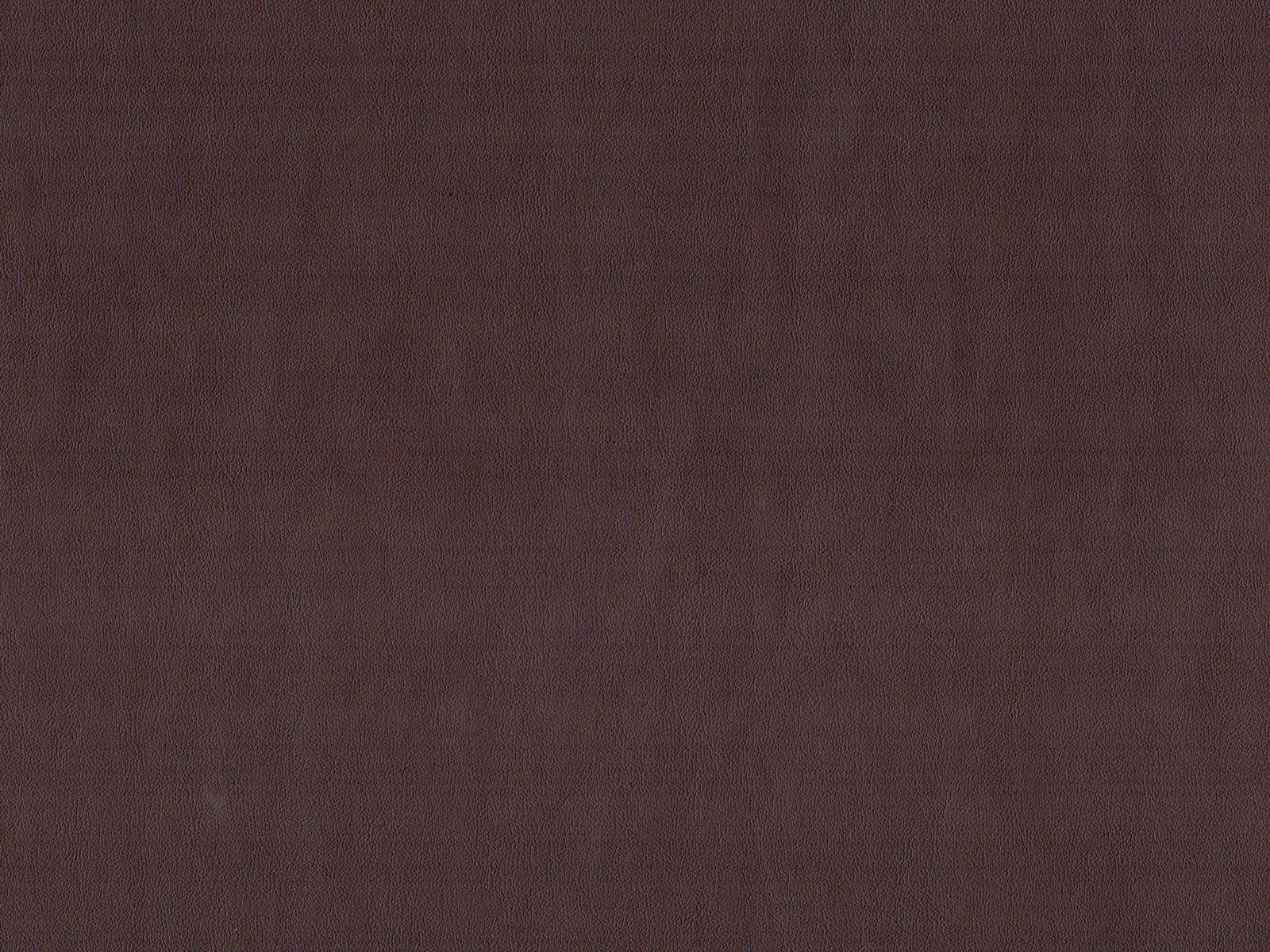 Deep brown-plum faux leather swatch showing a fine, subtly ridged vertical grain