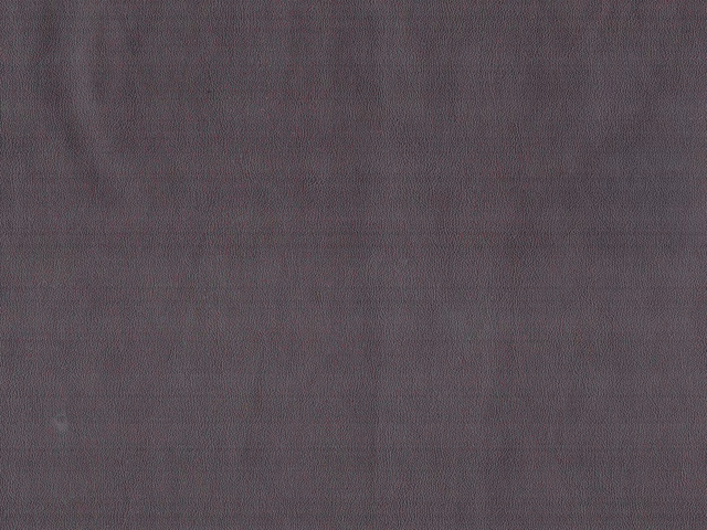 Smoky mauve-grey faux leather with a softly mottled fine-grain surface