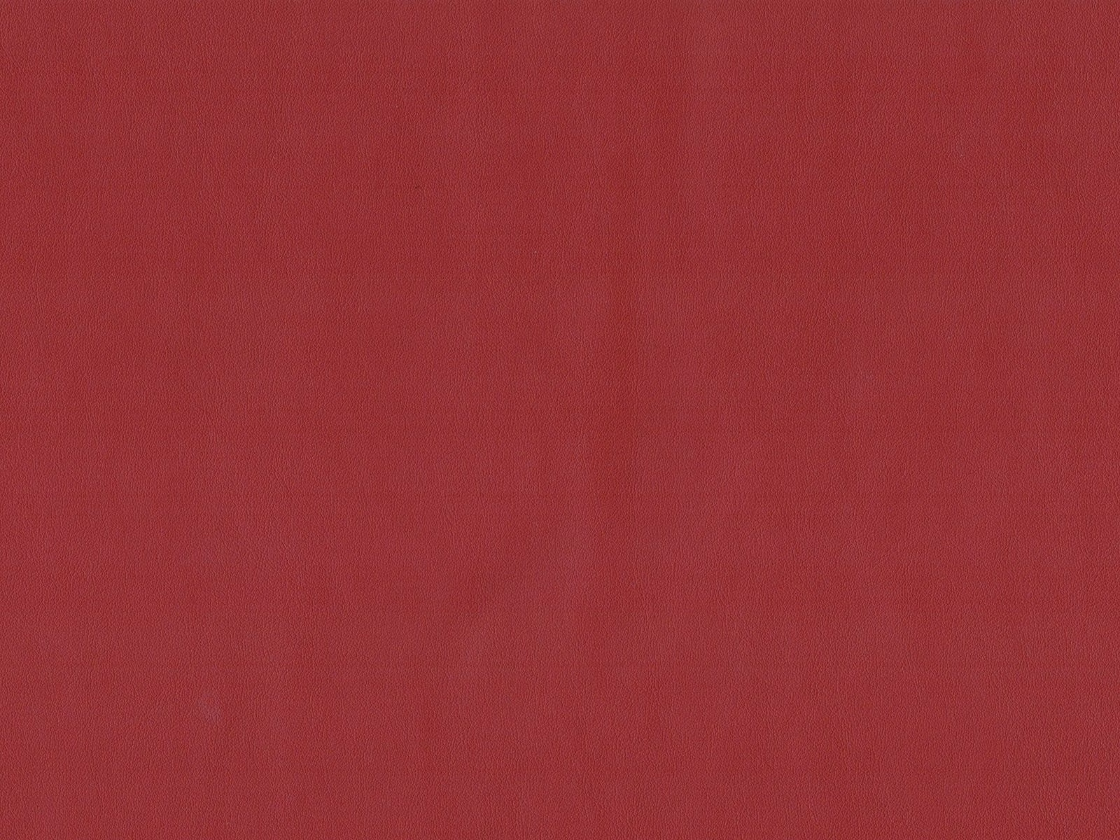 Deep crimson-red faux leather with a fine, subtly shaded surface