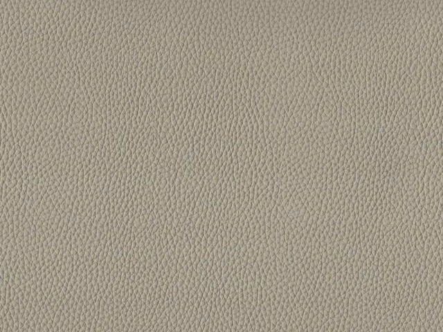 Pale warm taupe faux leather with a fine irregular pebbled grain texture