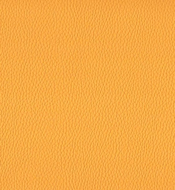Warm ochre-gold faux leather with a fine, irregular pebbled grain