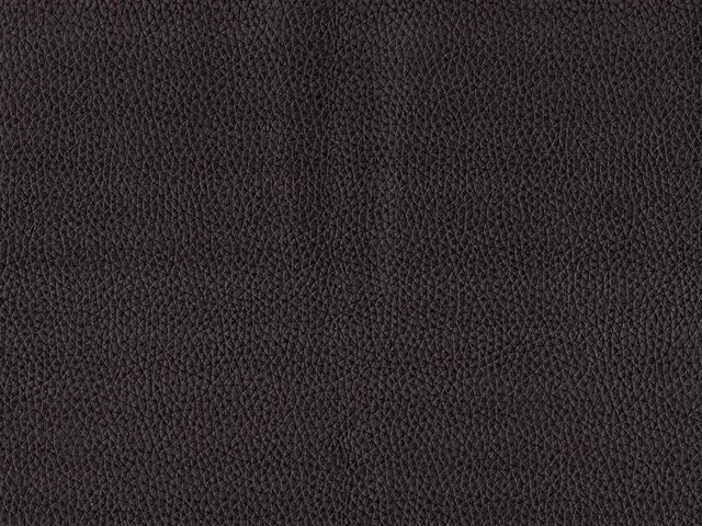Close-up of charcoal-black pebbled faux leather with a fine low-sheen grain