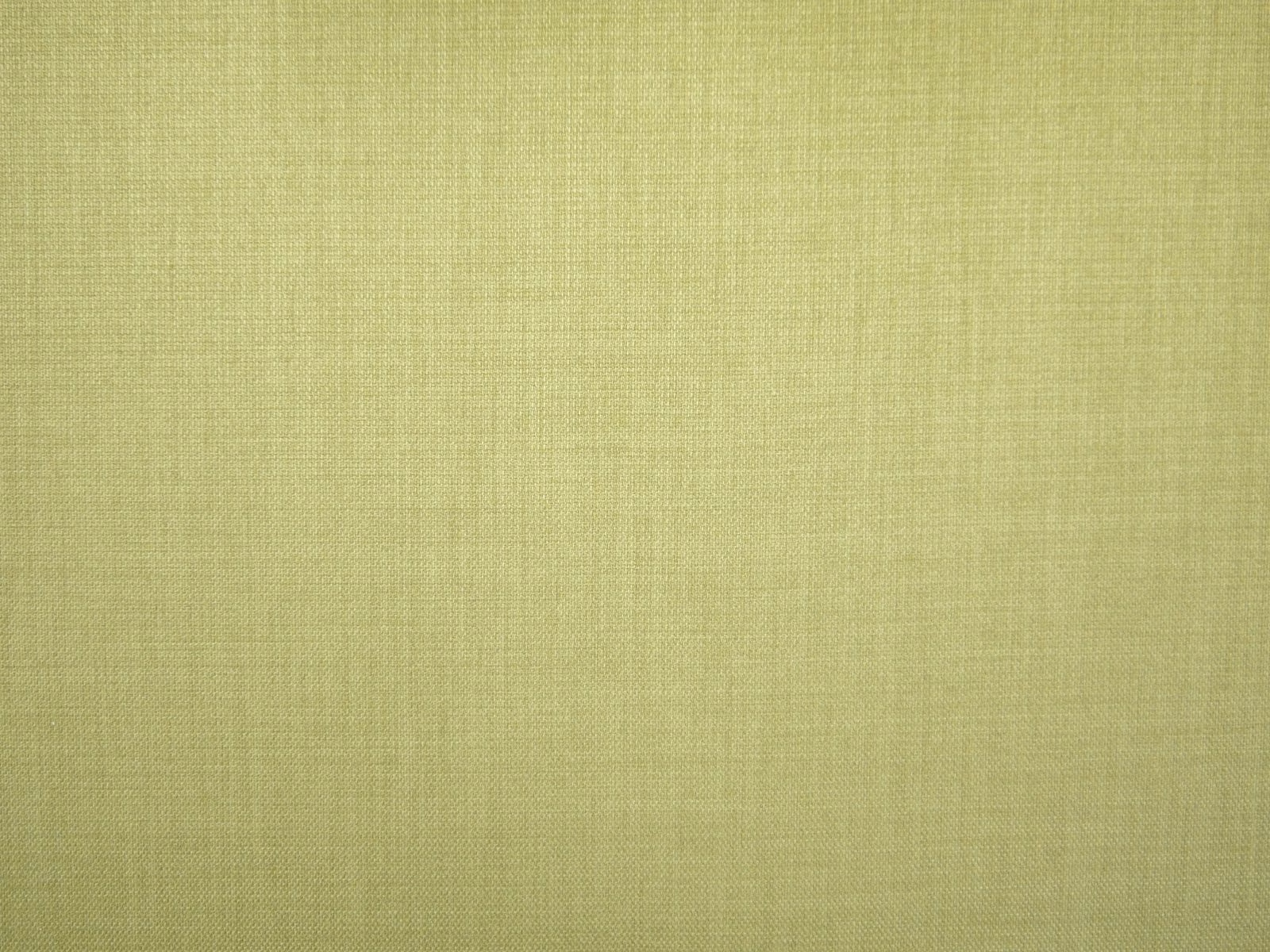 Muted yellow-green flat weave with fine vertical texture and soft tonal variation