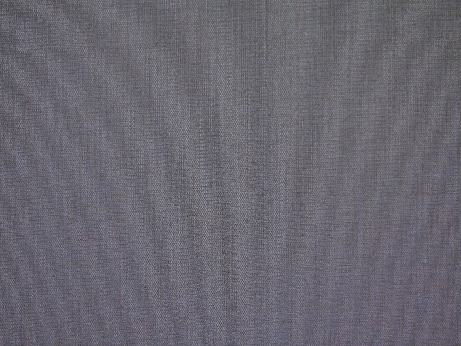 Muted mushroom taupe flat weave with subtle crosshatch texture in close-up